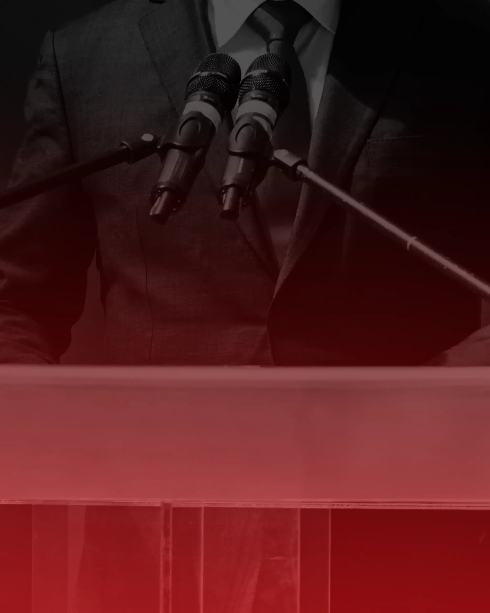 We Are Berlin – Eventagentur – Dieses Bild zeigt einen Politiker oder Wirtschaftsführer bei einer Rede auf einem Podium.